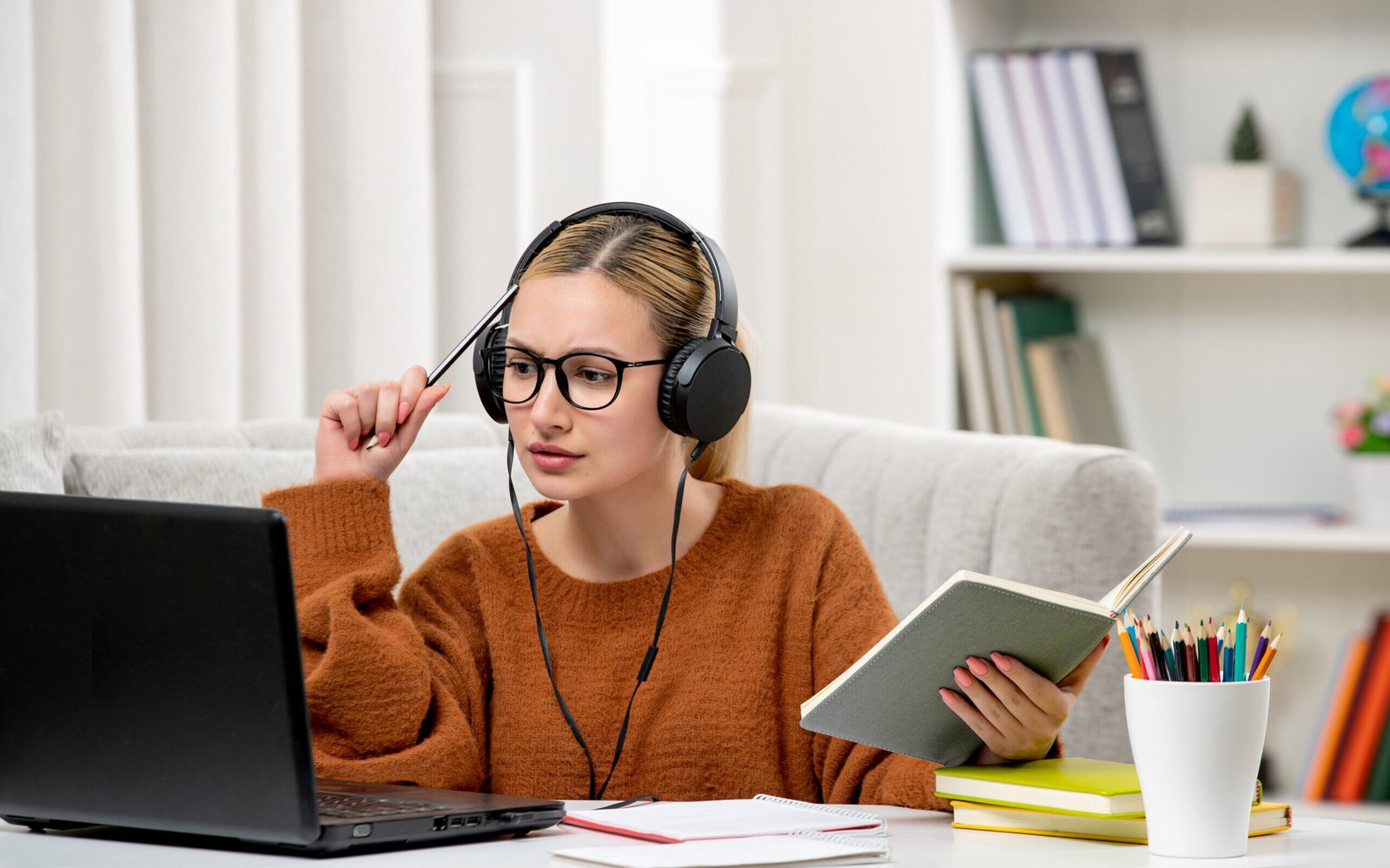 student-online-cute-girl-glasses-sweater-studying-computer-listening-lecture